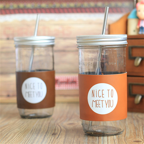 Haonai glass mason jar with split metal lid,stainless steel straw and PU cover,500ml drinking glass jar.