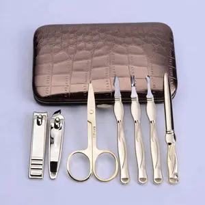 Supplier of Heavy Duty Grooming Stainless Steel Real Gold Plating Manicure Nail Care Tools Set