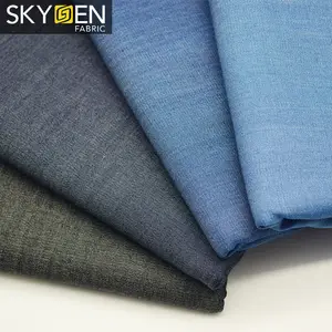 Skygen Guangzhou stocklot all'ingrosso del tessuto di saia 100% jutecell indigo denim morbido tessuto per camicie - Product Image 1
