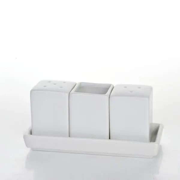 O quadrado branco modela utensílios de mesa ajustados da garrafa cerâmica condimento para a cozinha