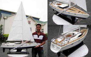 เรือจำลองไม้โอสเตอร์ 72 พร้อมอุปกรณ์เสริมของเล่นเป่าลม เรือยอชท์หรูหรา ผลิตในเวียดนาม โดยบริษัท จีเอ เอ็นฮีน จำกัด รุ่น YT0032P - Product Image 4