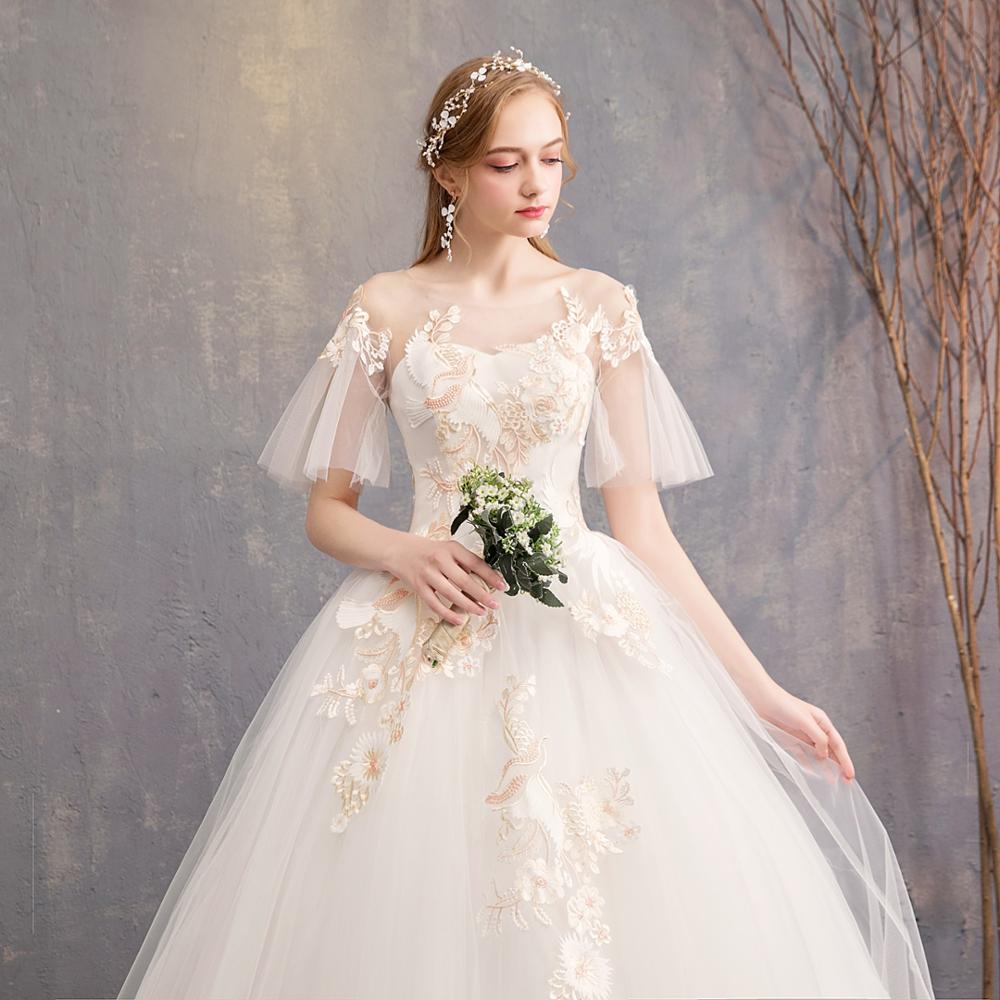 slim fit dress slacks Courthouse wedding dress with short flared skirt  La Novale Atelier