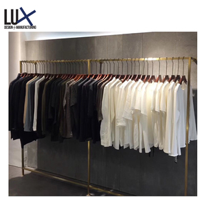 Estante de exhibición de tienda de ropa de diseño moderno personalizado LUX, chapado en oro rosa, garantía de 5 años, capacidad de producción anual de 500 tiendas - Product Image 6