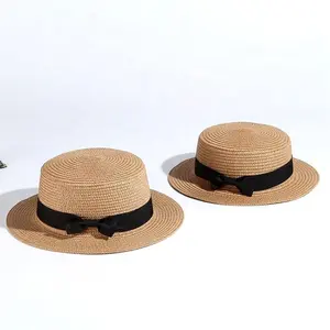 Einfache Sommer Eltern-Kind Strand hut weiblich lässig Panama hut Lady Brand Frauen flache Krempe Bowknot Stroh kappen Mädchen Sonnenhut