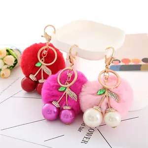 Hot promotional lovely cherry pom pom keychain bling bling fruit rabbit fur keychain drill bit girls keychain