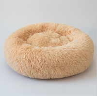 Livraison directe usine chinoise meilleur prix long rond palissandre calmant chien lit cordon en peluche lit pour animaux de compagnie