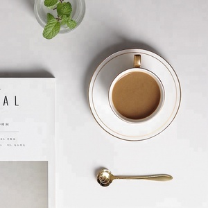 Juego de taza y platillo de té y café de cerámica blanca reutilizable de porcelana de postre de calidad superior para servir té y café - Product Image 3