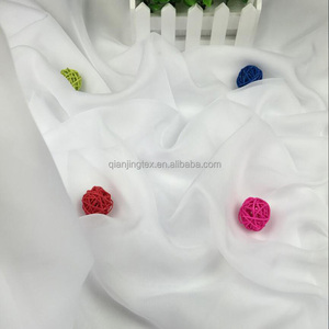 <span class=keywords><strong>Tela</strong></span> de Chifón Blanca Sedosa Transparente Delgada de 30D a Precio de Fábrica para Vestido de Verano - Product Image 1