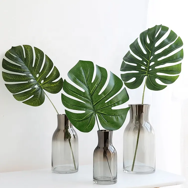 18 disegni Fake Faux Silk Plastic Leaves Turtle Palm Leaf Palm Sprat piante artificiali di Monstera per la decorazione