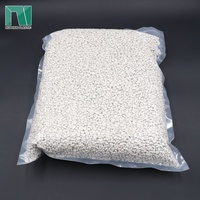 Granulés anti-mousse Shandong NUOSEN pour film plastique PE, à base d'oxyde de calcium 75%-85% et d'absorption d'eau 20%
