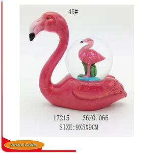 polyresin flamingo with snow globe