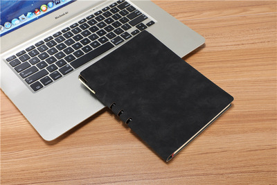 notebook embossed with pen