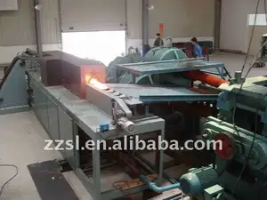 Diathermanous industrial furnace for forging and extrusion