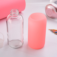 Réutilisable logo personnalisé sur manchon en silicone bouteille d'eau en verre avec couvercle à vis