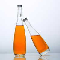 Fournisseur chinois Meilleur vendeur evian Bouteille d'eau minérale pour boisson Bouteille en verre d'eau gazeuse de source avec bouchon en alun 330ml
