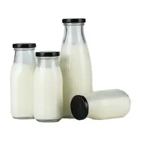 थोक खाद्य ग्रेड स्पष्ट दूध की बोतल ग्लास 100 ml 200 ml 250 ml 500 ml 1000 ml गिलास दूध की बोतल पेंच टोपी के साथ