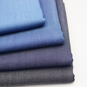 Skygen Guangzhou stocklot all'ingrosso del tessuto di saia 100% jutecell indigo denim morbido tessuto per camicie - Product Image 3
