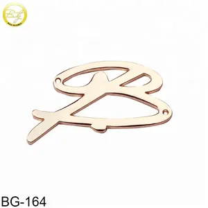 Gold plated alphabet letter tags metal clothing brand logo label for dress