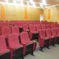 Fauteuil de cinéma pour la maison avec tablette intégrée