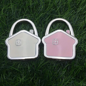 Émail rose couleur <span class=keywords><strong>maison</strong></span> forme métal sac cintre pour dame sac - Product Image 1