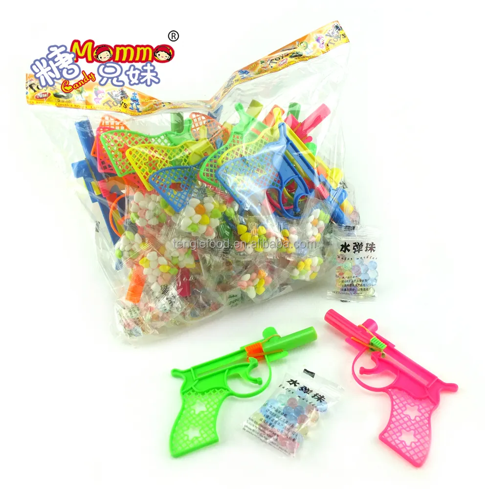 حقيبة التعبئة مصغرة الكرتون البلاستيك مسدس لعبة مع جولة حبوب منع الحمل على شكل حبات الحلوى