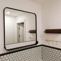 Металлическое зеркало для декора стены с полкой