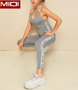 Commercio all'ingrosso Activewear Palestra Donna Allenamento di Un Pezzo Trasversale Posteriore Della Tuta Oem Personalizzata Donne di Forma Fisica di Sport In Bianco di Compressione Della Tuta