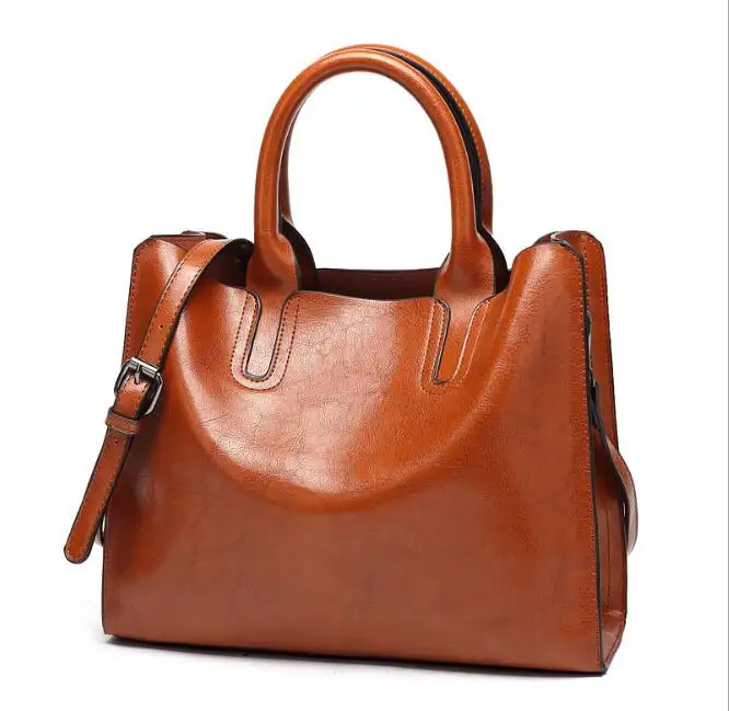 24 saat hızlı kargo moda tasarımcısı Pu deri malzeme kadın büyük el çantası çanta toptan bayan çanta