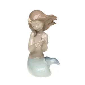 Figurita de sirena de cerámica para niña pequeña