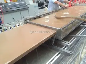 Cina pemasok pvc kayu plastik komposit pintu panel membuat mesin/lini produksi profil wpc