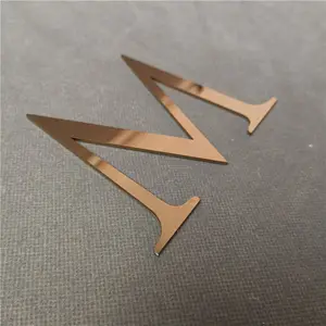 Letras de metal 3D de acero inoxidable de China con alfabeto dorado para Decoración - Product Image 1