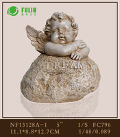 Statue commémorative en résine de chérubin ange pour cimetière, avec ailes détaillées et expression sereine