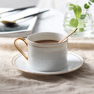 Juego de taza y platillo de té y café de cerámica blanca reutilizable de porcelana de postre de calidad superior para servir té y café - Product Image 2