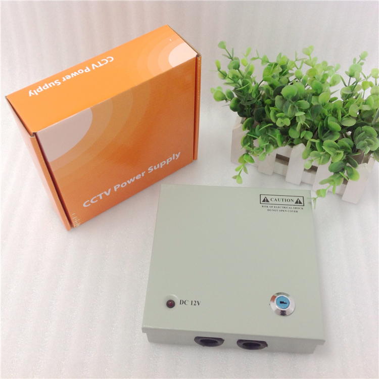DC 12V5A 4ch sortie 60W alimentation multiple avec batterie de secours pour système de caméra CCTV boîtier métallique alimentation à découpage