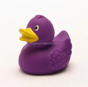 Pato de goma, patito de goma y morado y patito de goma y pato de baño