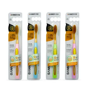 BANNER gold handle golden soft bristles with hot silver logo toothbrush