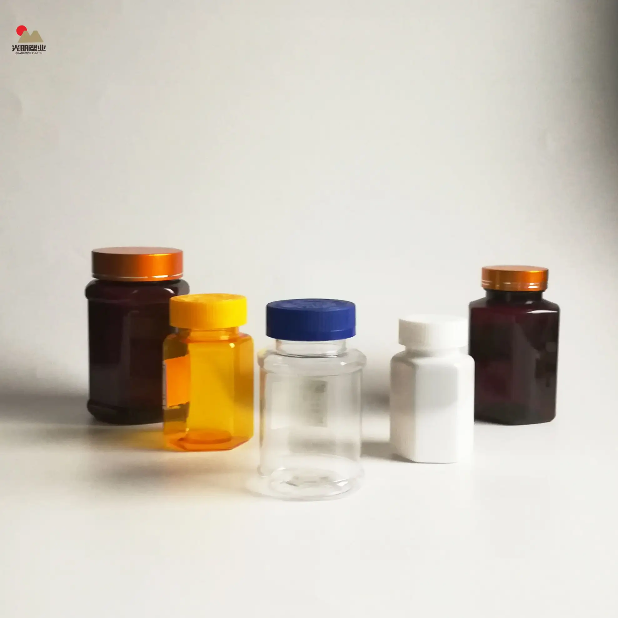 China Lieferant Bunte Lebensmittel qualität PET Rhombus Kunststoff verpackung Honig flasche Gesundheits produkte Verpackung Kunststoff behälter