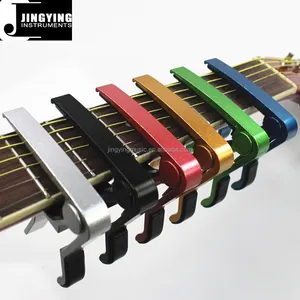 Venta al por mayor, alta calidad, venta directa de fábrica, cejilla de guitarra de aluminio cortada a mano