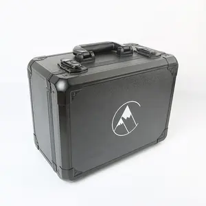 Heavy-duty aluminum frame matte tool box in all black with hard foam inside and logo on the lid