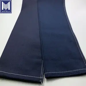 using rapier loom making machine blue warp black weft 75% cotton 25% polyester blend TC jeans denim fabric in bangladesh