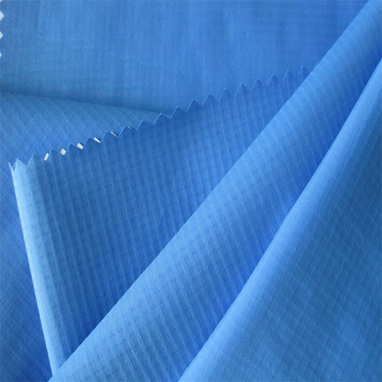 Ткань из нейлона. 100 нейлон. Односторонний термоклеевой нейлон таффета с покрытием. Нейлоновая ткань для одежды. Авиационный нейлон ткань.