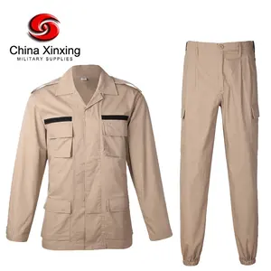 Xinxing ชุดเดรสผ้าฝ้ายโพลีเอสเตอร์ทะเลทรายชุดเครื่องแบบกางเกงต่อสู้สีกากี Bdu โรงงาน BD07