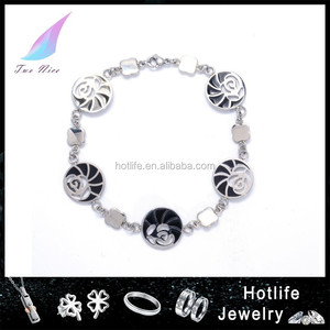 <span class=keywords><strong>Alex</strong></span> et ani conception 316L en acier inoxydable montre bracelet avec flottante charme médaillon - Product Image 1