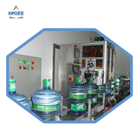 Machine d'étiquetage à manchon rétractable pour bouteilles de 5 gallons avec tunnel de rétraction thermique