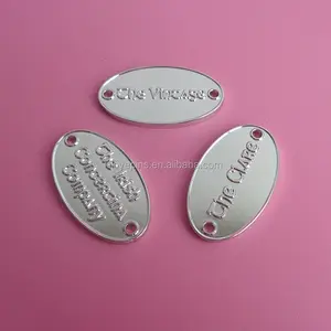 Wholesale Shiny Silver Plating Oval Shape Embossed Logo Metal Tag Name Plate