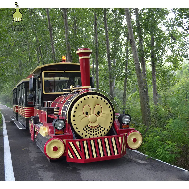 Los niños juegos infantiles al aire libre paseo en tren turístico locomotoras tren