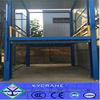 Plate-forme élévatrice de voiture à quatre poteaux 220V Construction en acier Câble Sling Type Palan à moteur Caractéristique de sécurité pour les hôtels Fermes utilisées