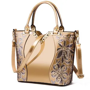 Guangzhou supplier latest black patent leather embroidery bags women handbags