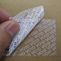 Étiquettes de sécurité anti-effraction personnalisées avec logo blanc et code-barres découpé