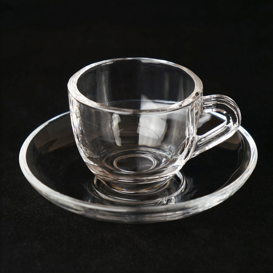 Clear glass coffee cup set with handle and saucer
